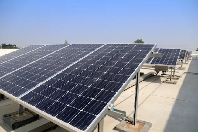 Solar modules on a building's roof in Jaipur, Rajasthan, contributing to renewable energy solutions through solar power.